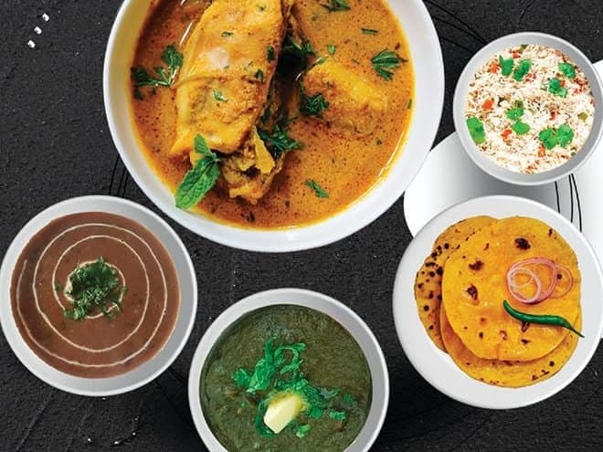 A Simran's Dhaba catering spread of curries, rice and fresh roti